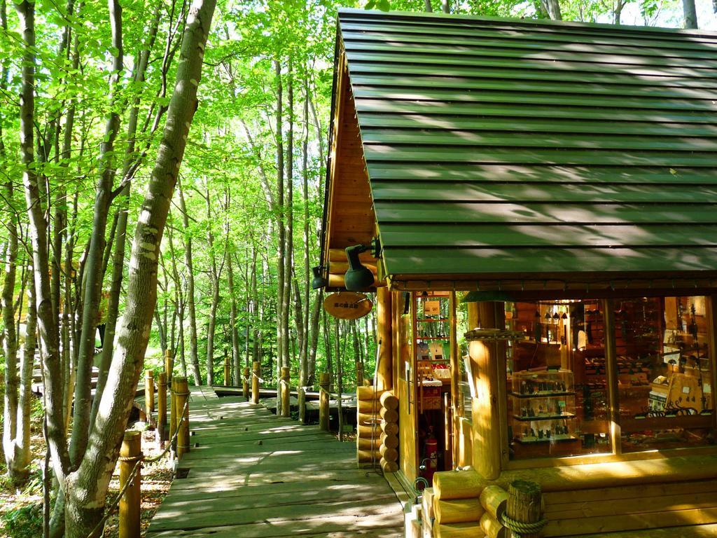 Shin Furano Prince Hotel Bagian luar foto The Log Cabin